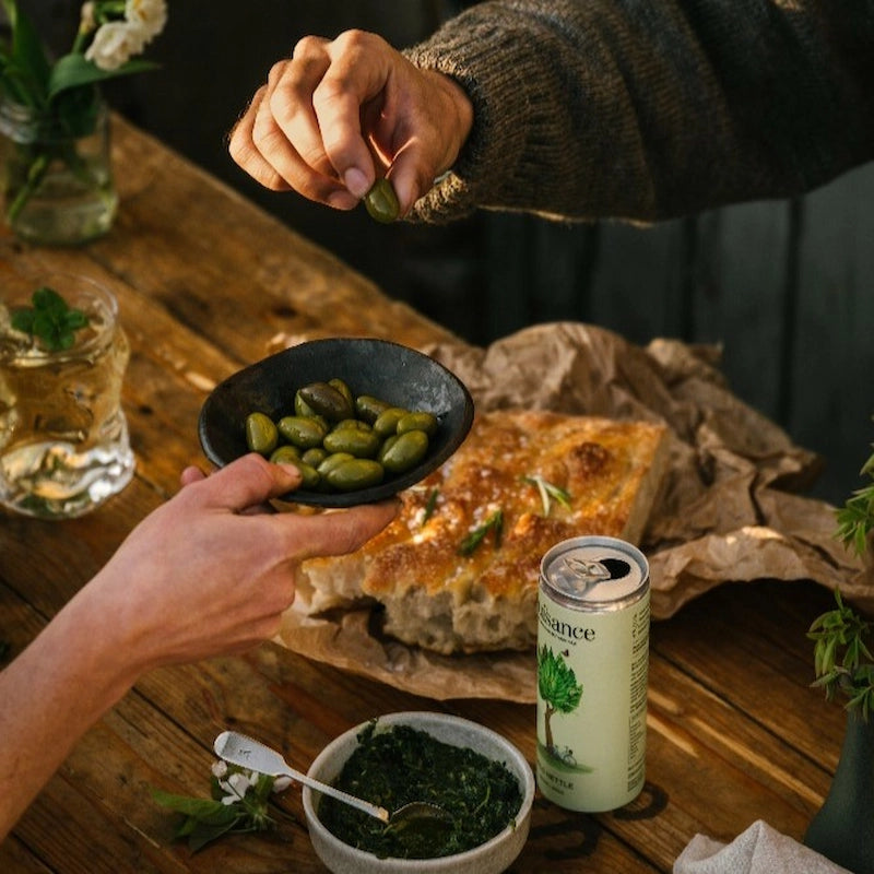 Patrons enjoying the natural, low-calorie, low-sugar premium Nettle & Elderflower botanical soft drink from Nuisance drinks served over brunch