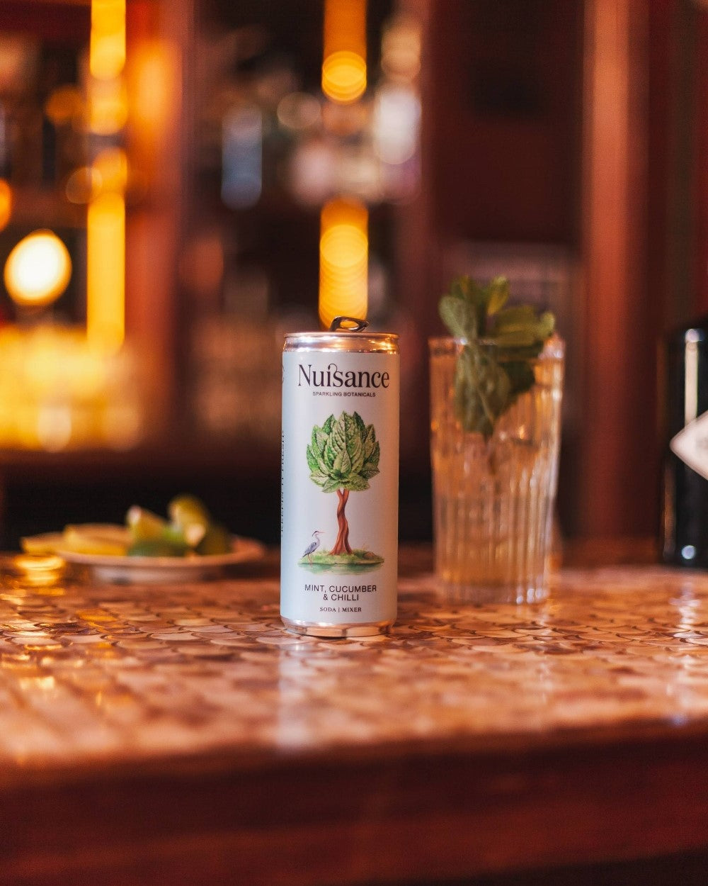 A cold refreshing cocktail of Gin, Lemon Juice and topped with refreshing can of premium Mint, Cucumber and Chilli botanical soft drink. from Scotland-based drinks start-up brand  Nuisance drinks