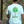 man wearing a nuisance drinks t-shirt with mint tree illustration