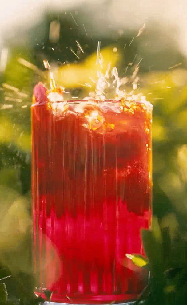 video for nuisance botanical sparkling drinks showing people, the ingredients and drink cans